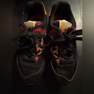 New Balance Sesame Street Kids Black and Orange Sneakers
